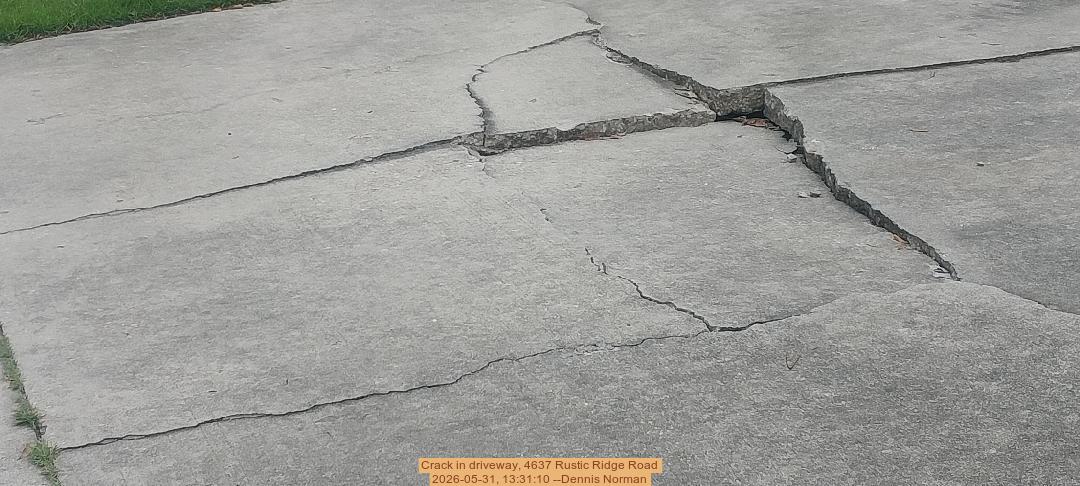 Crack in driveway, 4637 Rustic Ridge Road 2026-05-31, 13:31:10 --Dennis Norman