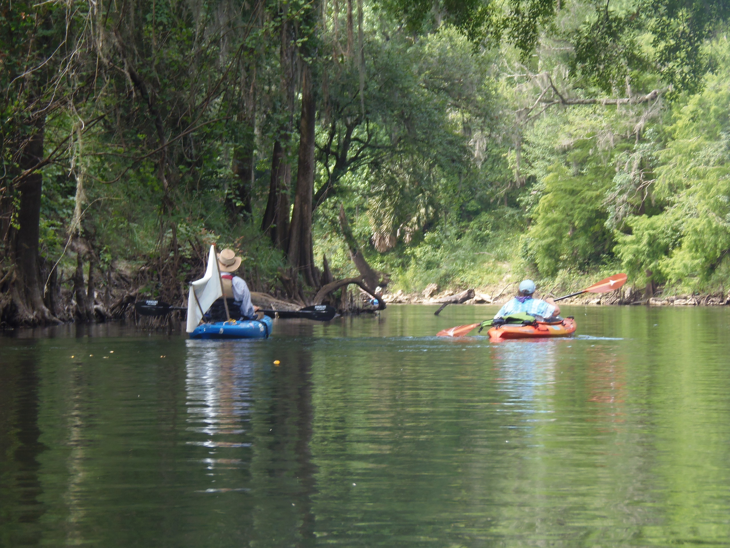 John S. Quarterman and Julie Bowland paddle downstream, 10:52:01