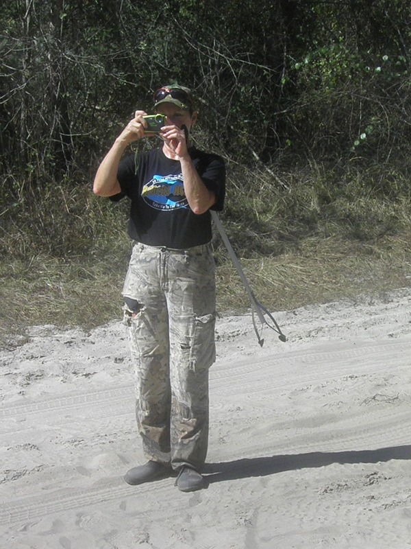 Suzy takes a photo of the group.