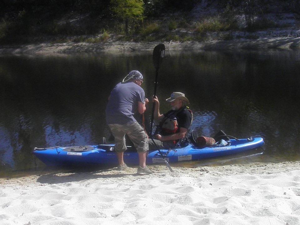 Scotti helps JSQ unload from the boat; Note fire extinguisher in back.