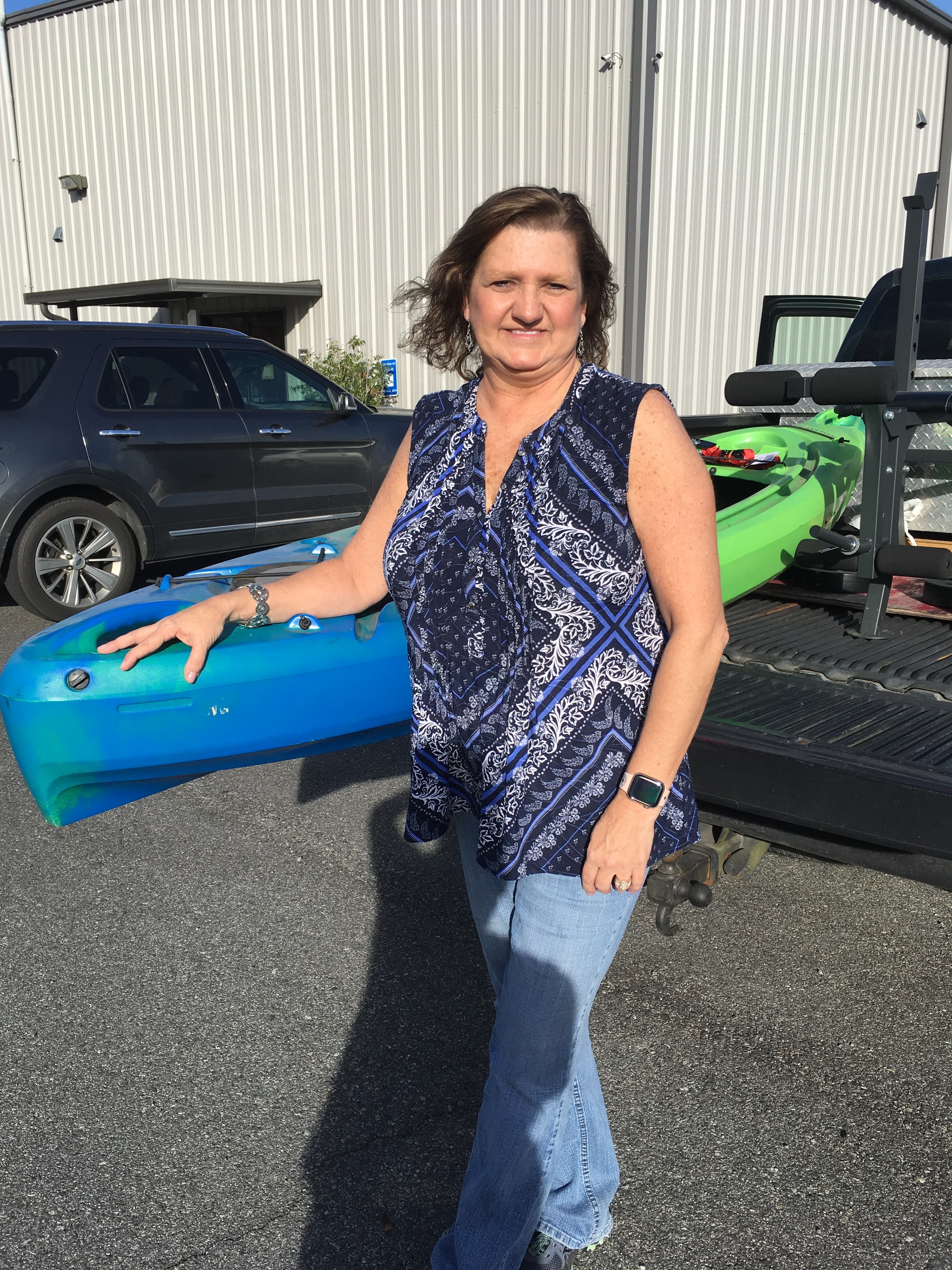 Rhonda Kelly with the kayak she won in the WWALS raffle