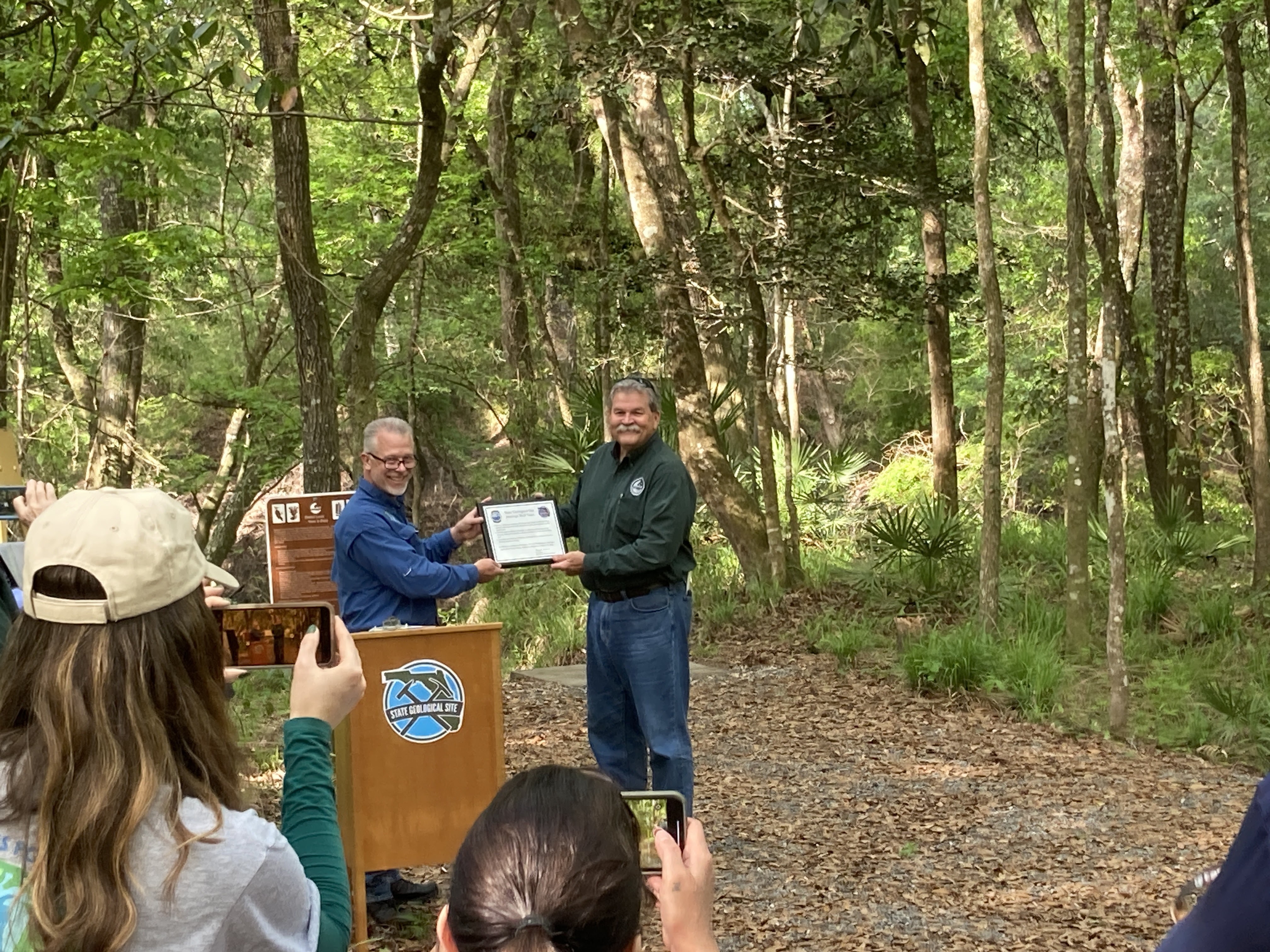 State Geologist Harley Means and SRWMD E.D. Hugh Thomas with certificate