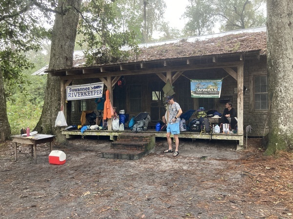 Standing under the porch roof --Gretchen Quarterman, 2024:11:11 08:04:47, 30.8560861, -82.2669444