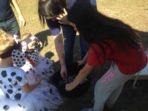 Girl Scouts helping