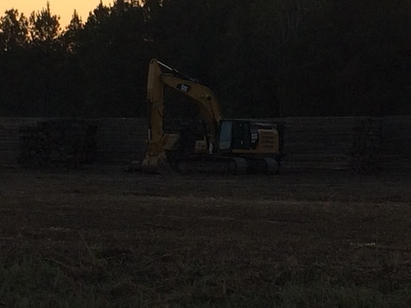 Backhoe and materials