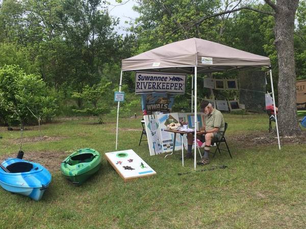 Kayaks and froggy toss game, Booth