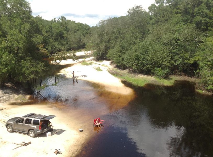 Bret Wagenhorst: Public access on north side of bridge, with cement strip boat ramp at higher water level but no facilities. Access road is unpaved and about 1/4 mile long. Nice sandy beach 2014-10-20